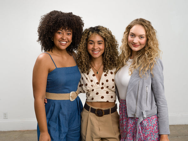 Three women on a white background