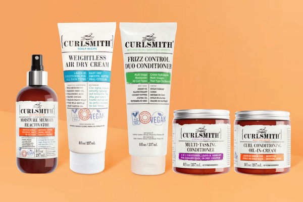 Curlsmith products on an orange background