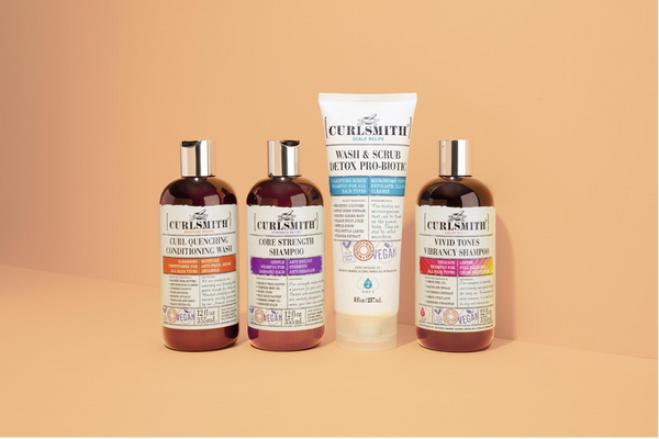 Four Curlsmith products on an orange background