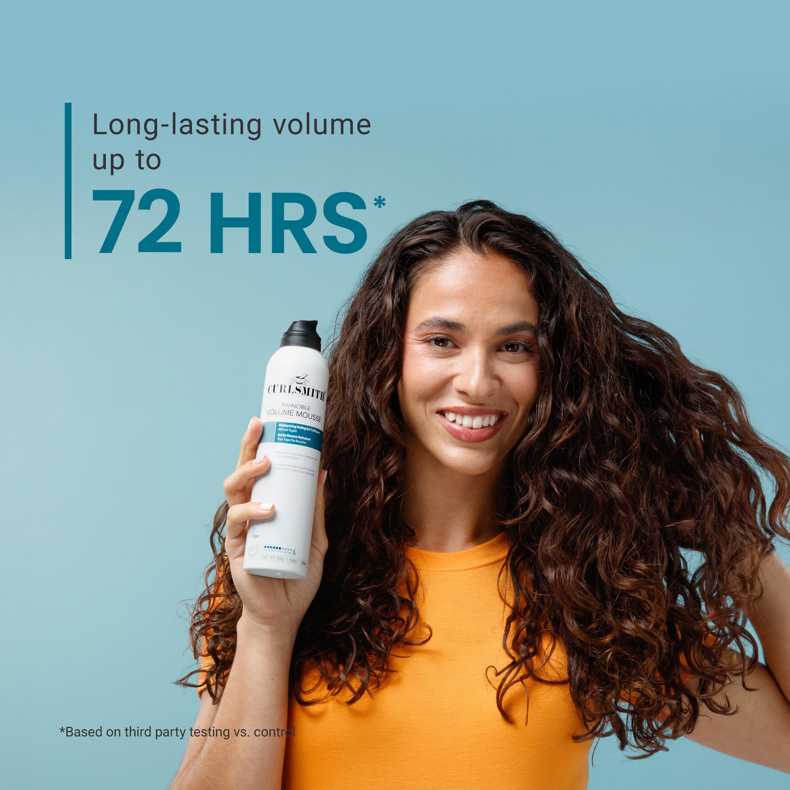 Woman holding a bottle of hair product with text about long-lasting volume on a blue background