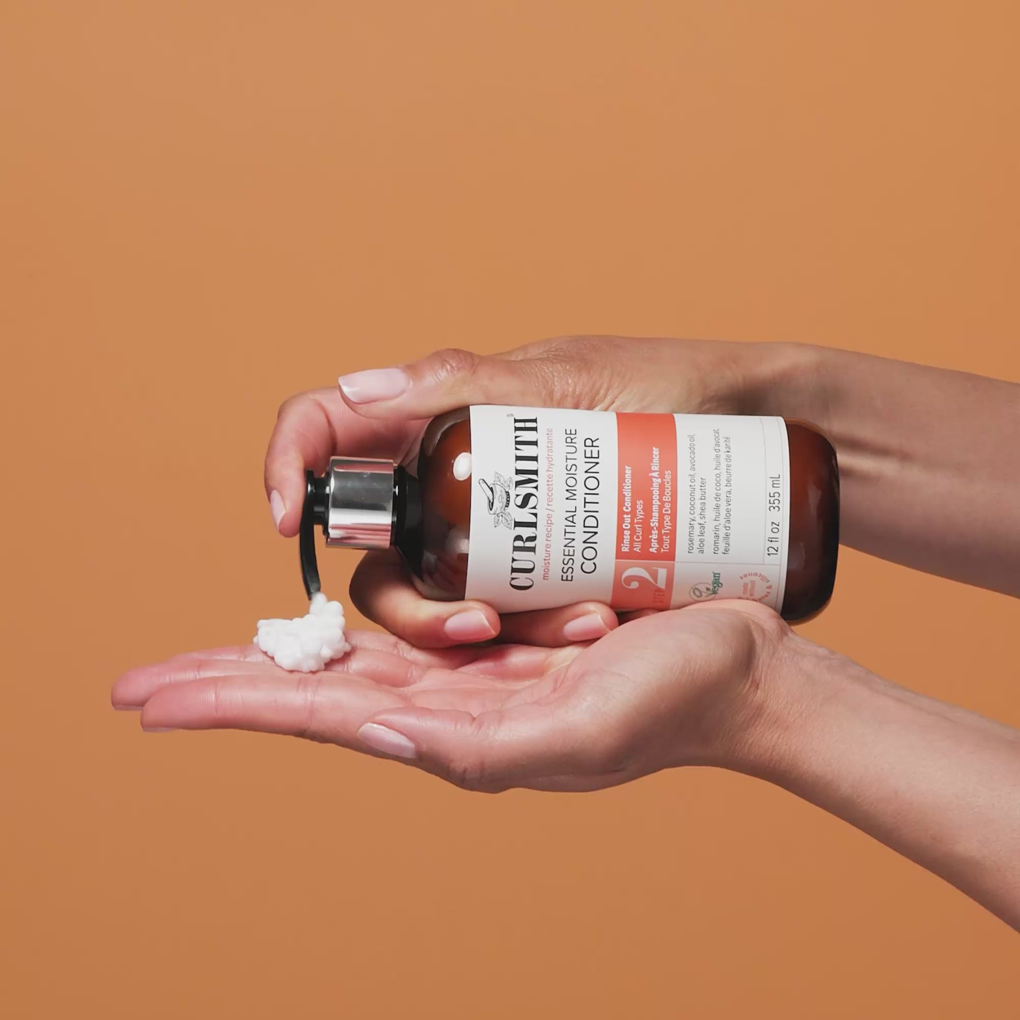 Applying Curlsmith Essential Moisture Conditioner