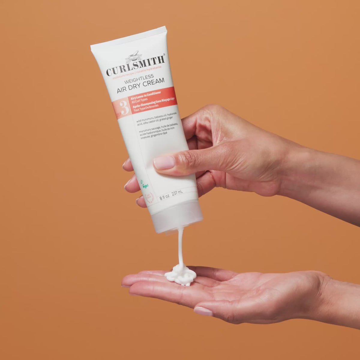 Person applying Curlsmith Weightless Air-Dry Cream